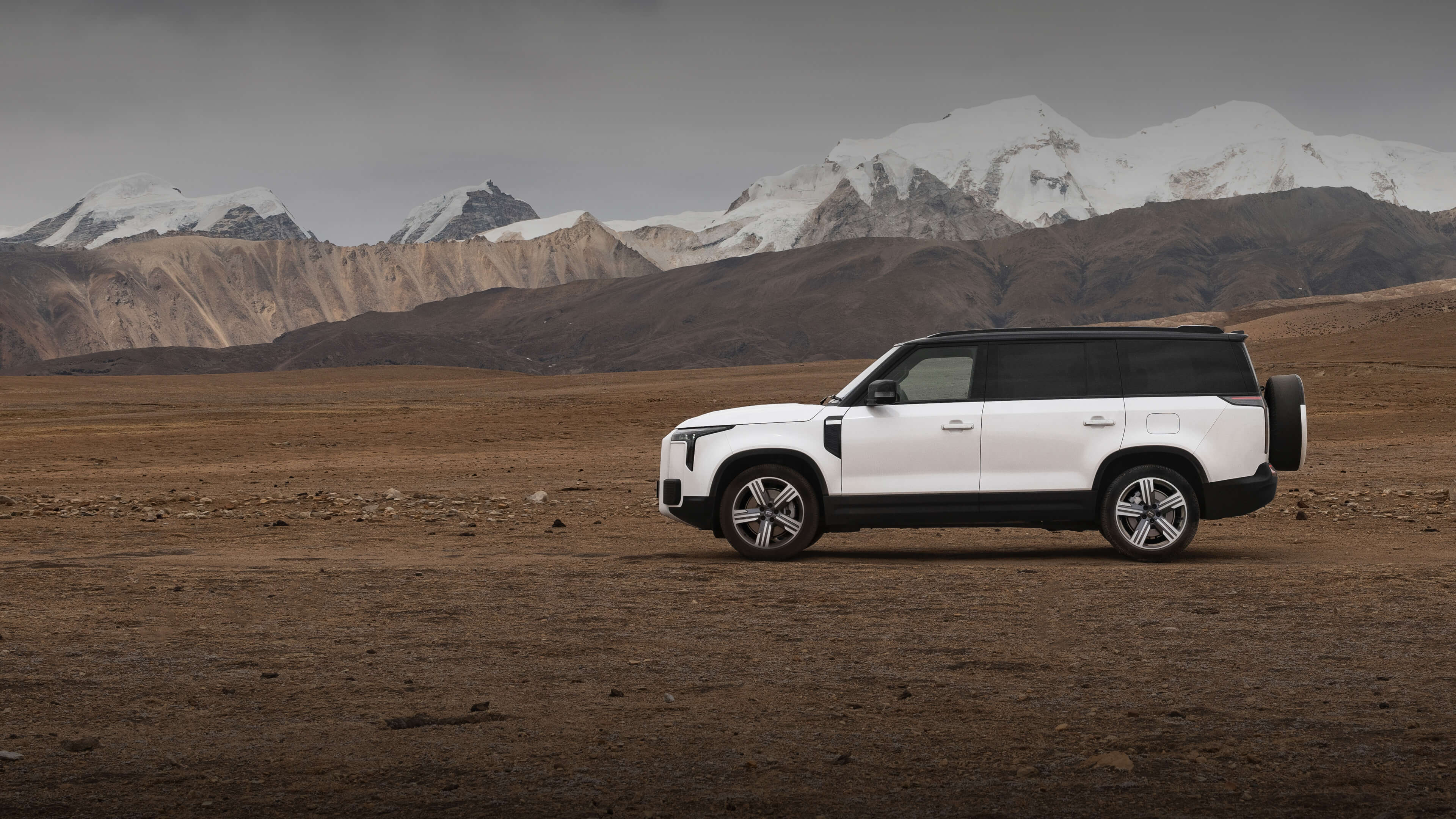 Luxury ROX vehicle in a mountain landscape